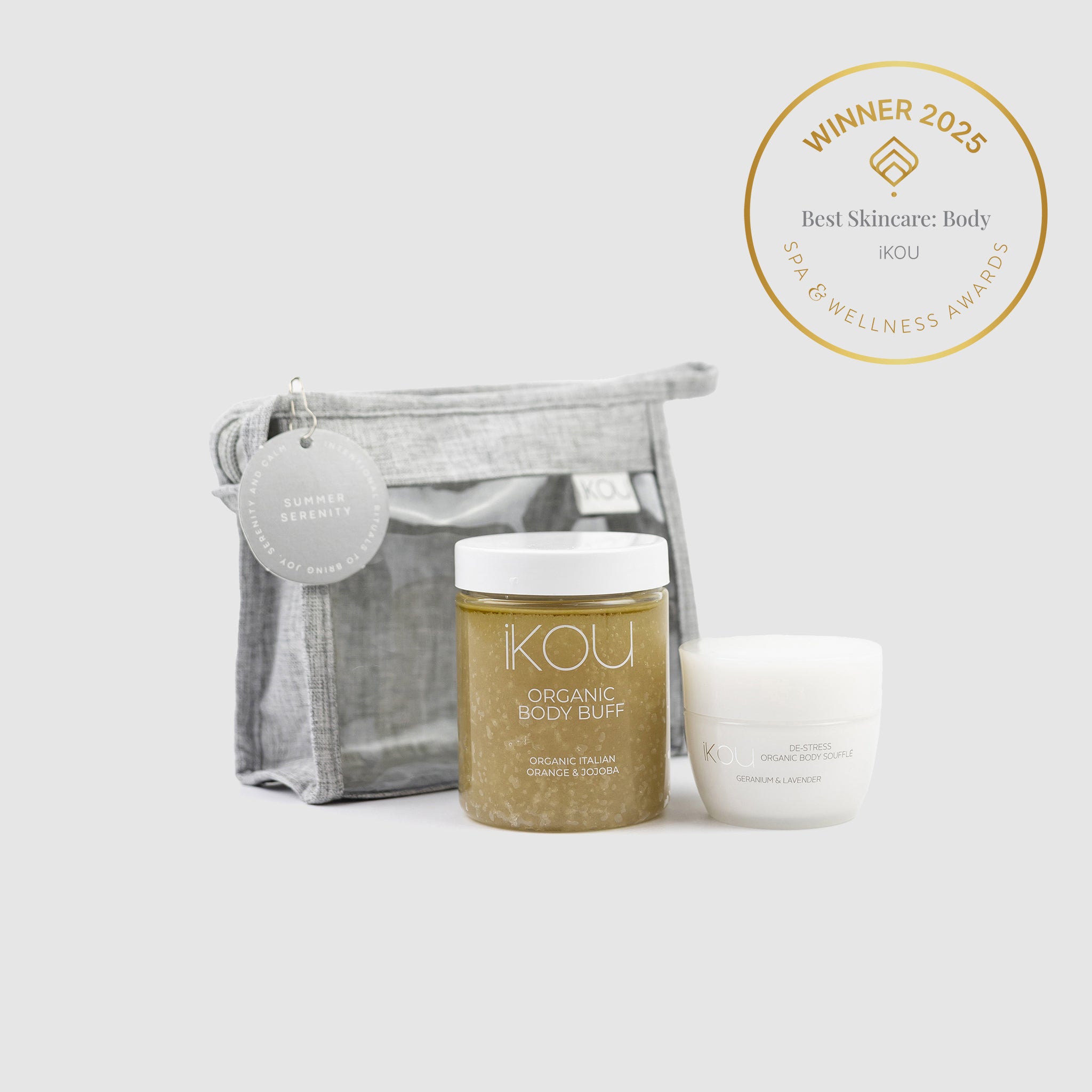 Skincare products with a gray bag and 'IKOU' branding on a white background, featuring an award badge.