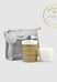 Skincare products with a gray bag and 'IKOU' branding on a white background, featuring an award badge.
