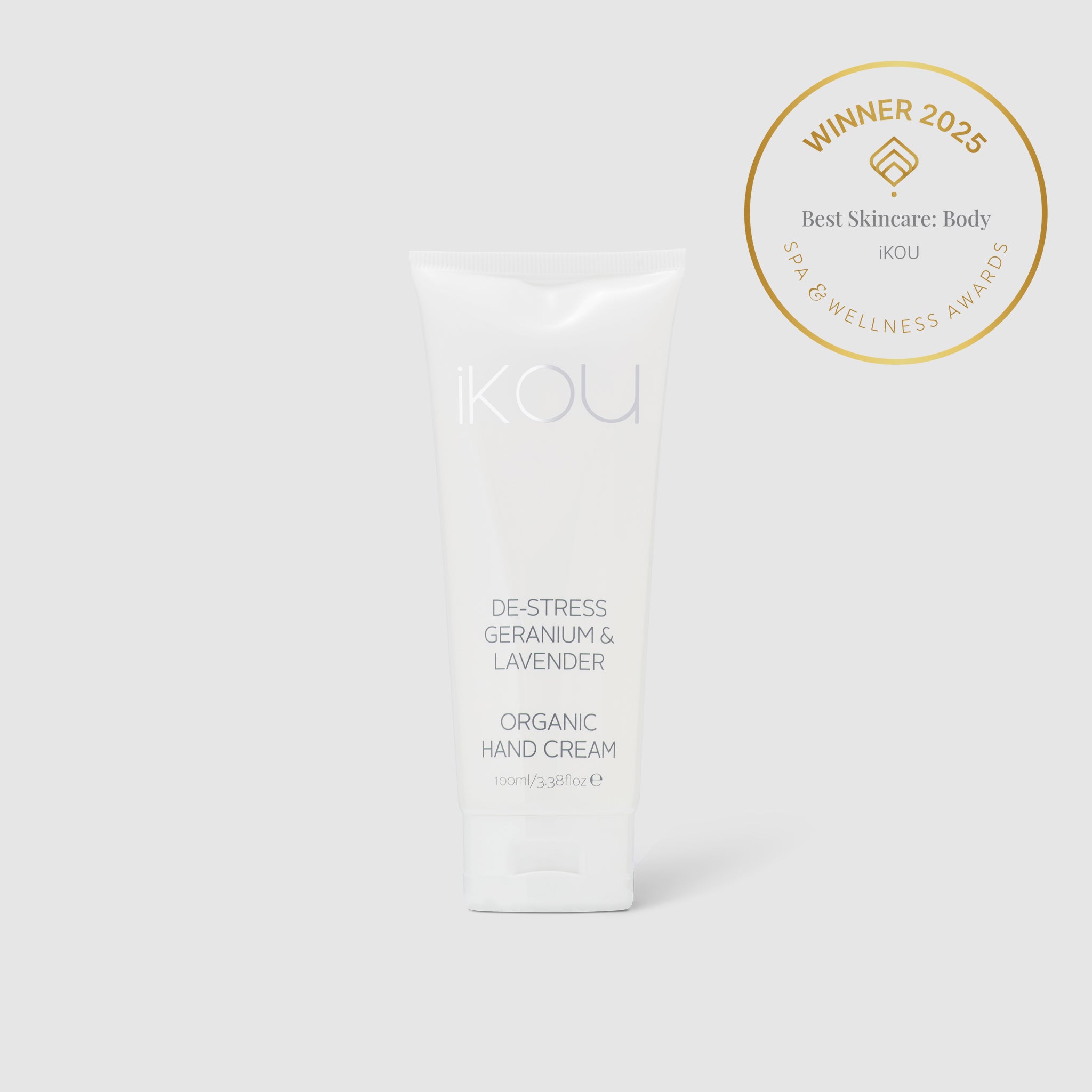 IKOU organic hand cream on a white background with an award badge above it.
