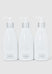 Three white bottles of KOOL hair care products on a light gray background