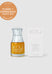 A bottle of iKOU Baobab & Neroli Calming Face Oil next to its white packaging box, with an bronze 'Clean + Conscious Awards 2026' badge in the top-left corner, set against a light grey background.