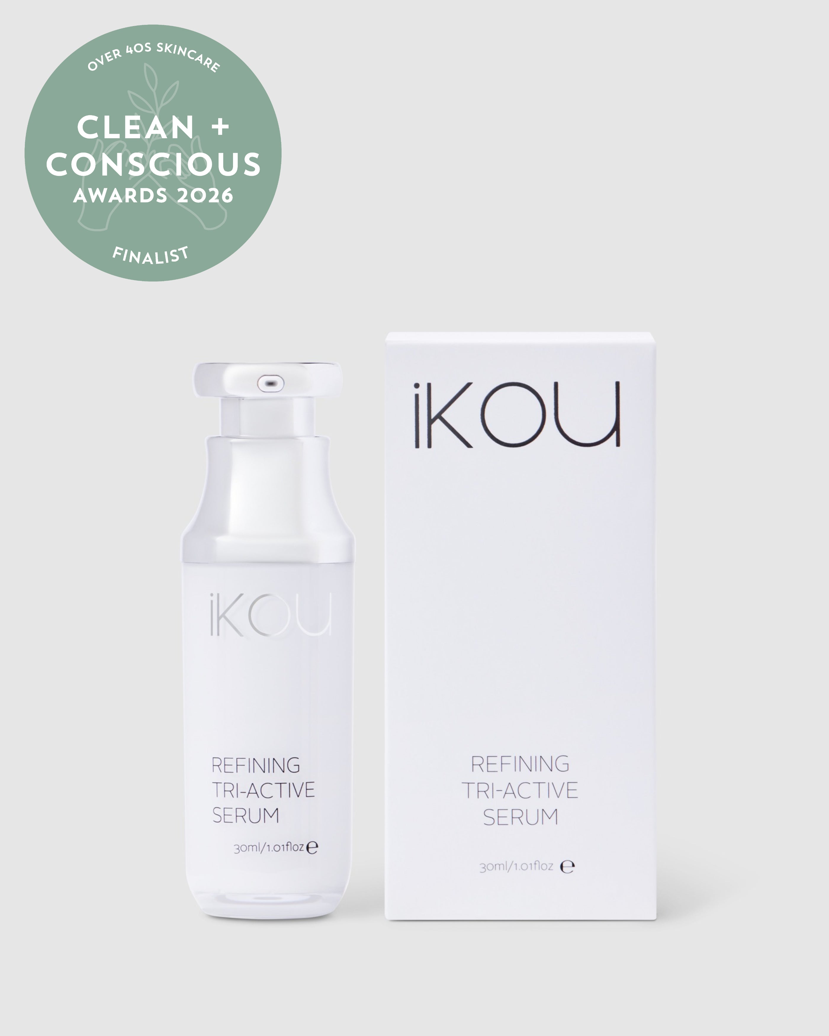 iKOU Refining Tri-Active Serum in a glass bottle, featuring a dropper for skincare with natural retinol and bakuchiol ingredients.