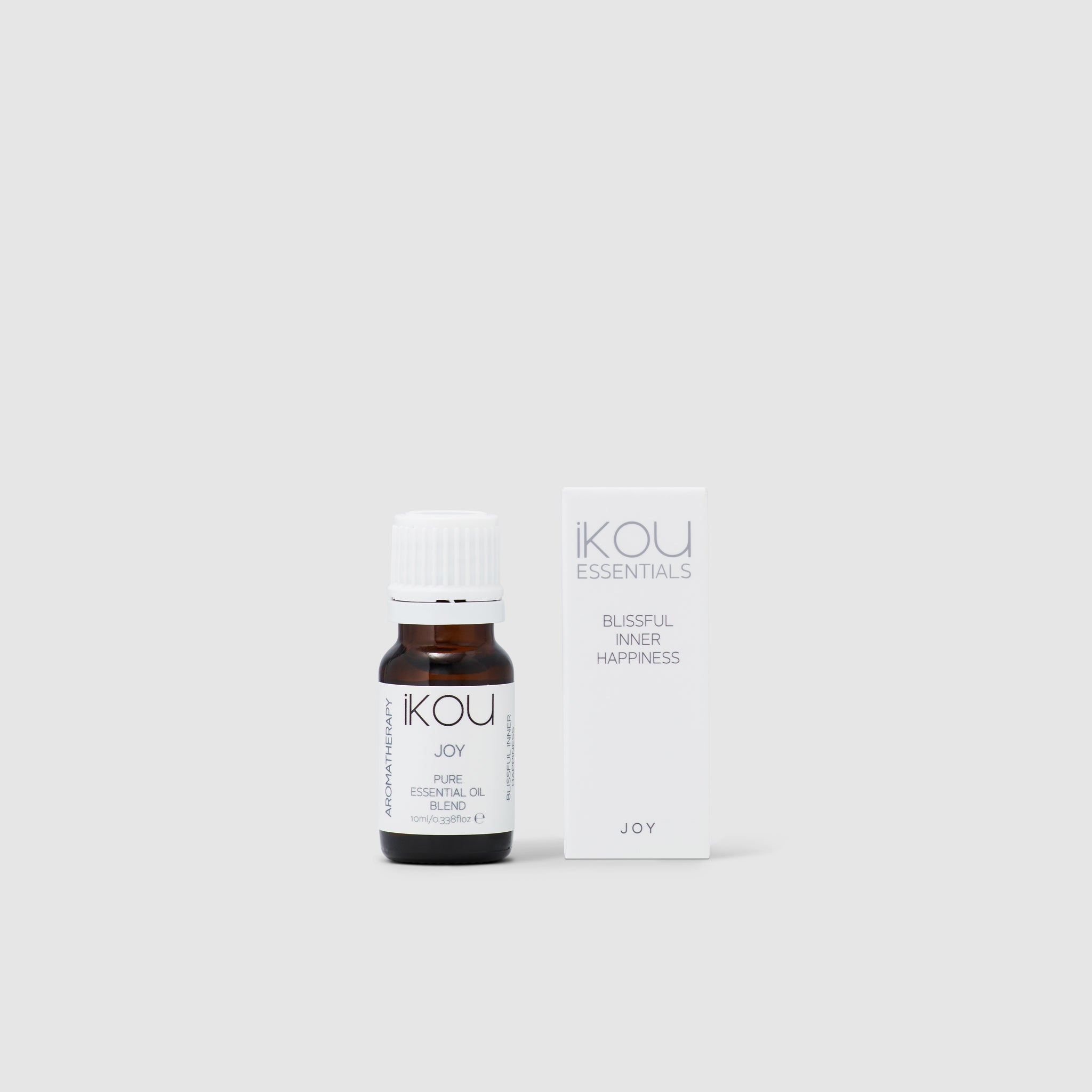 Ikou essential oil bottle and packaging on a white background
