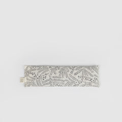 Patterned eye pillow on a light grey background