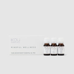 Three essential oil bottles with labels on a white background, featuring the brand 'IKOU'.