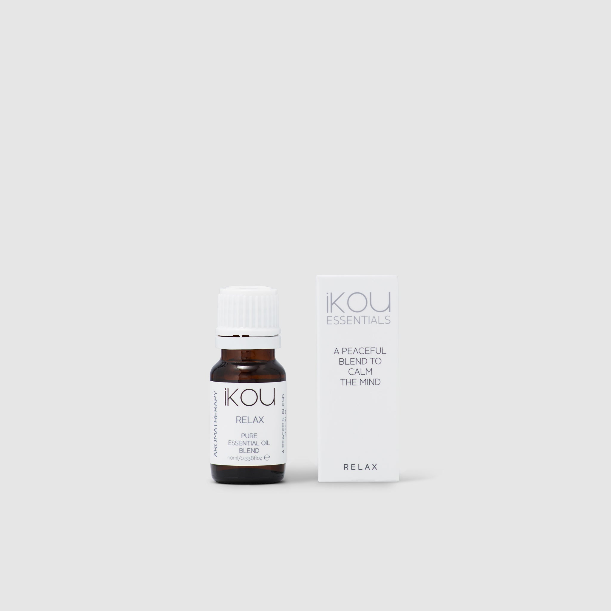 Ikou essential oil bottle and packaging on a white background