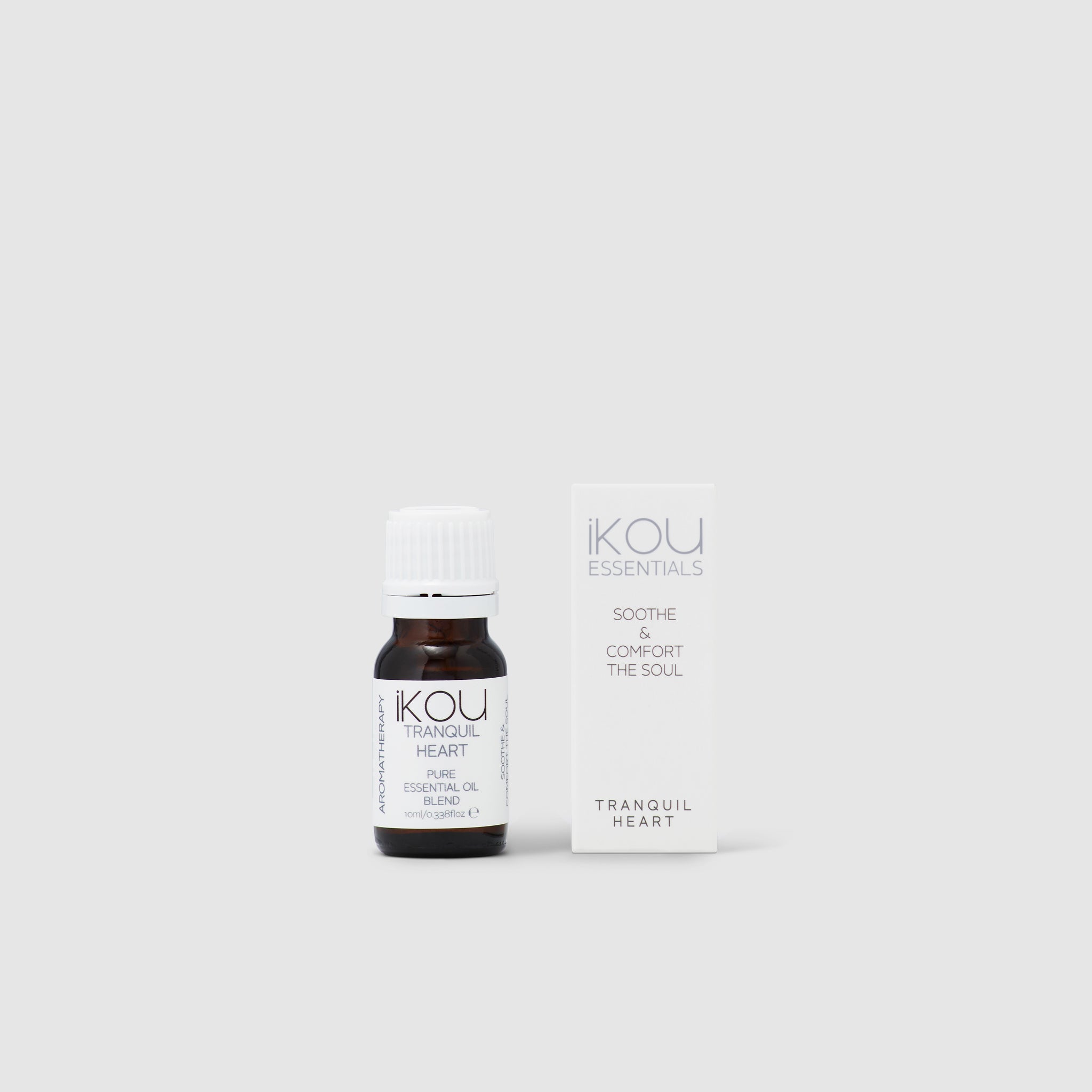 Ikou Essentials Tranquil Heart essential oil bottle and packaging on a light gray background