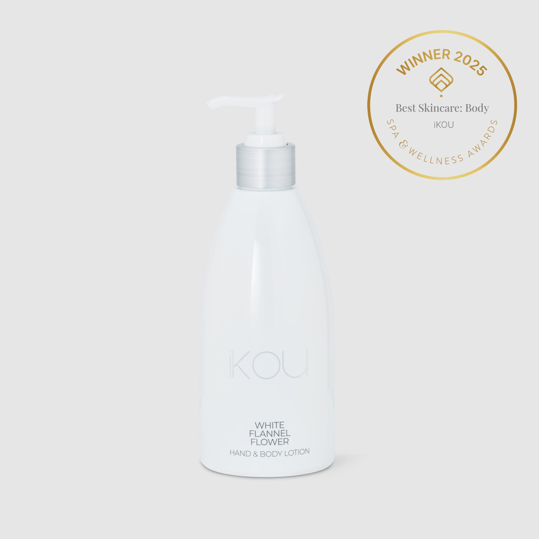 White lotion bottle labeled 'White Flannel Flower' with an award badge on a white background