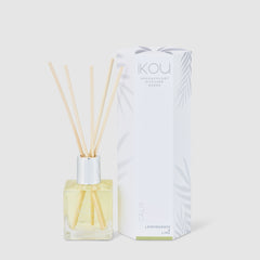 Aromatherapy diffuser with wooden sticks and packaging on a white background