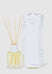 Aromatherapy diffuser with wooden sticks and packaging on a white background