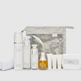 iKOU Core 4 gift pack featuring spa headband, skincare products, and wellness essentials arranged in an elegant gift set.