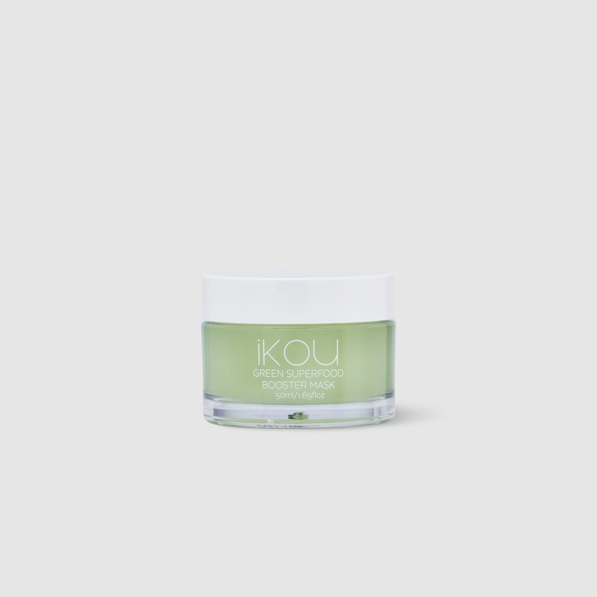 Green skincare product jar with 'ikou' branding on a white background