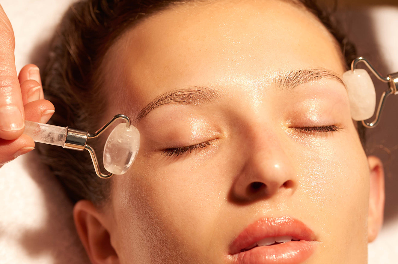Clear White Crystal Quartz Facial Roller in bag - IKOU