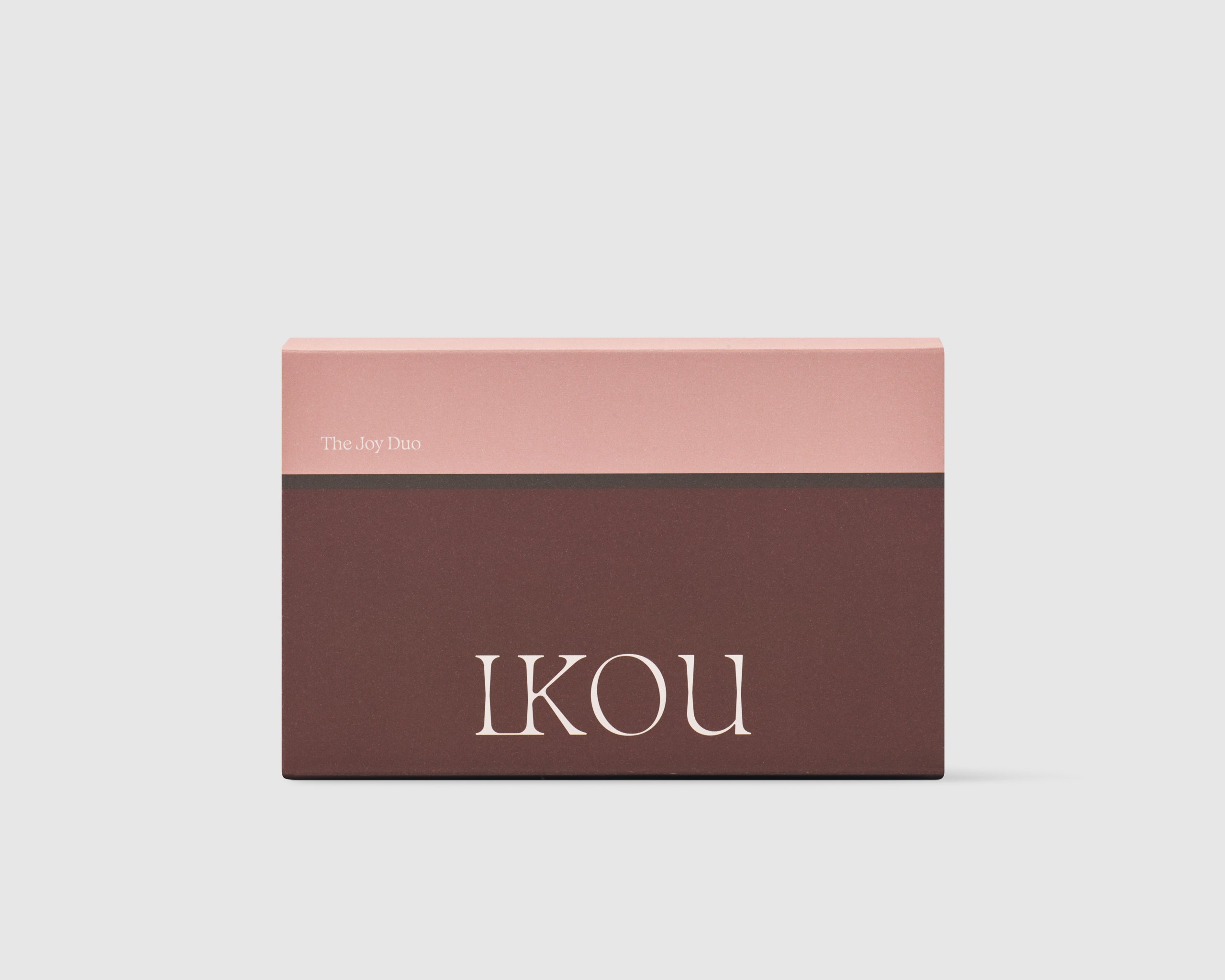 iKOU The Joy Duo gift pack featuring two skincare products with vibrant packaging and natural ingredients.