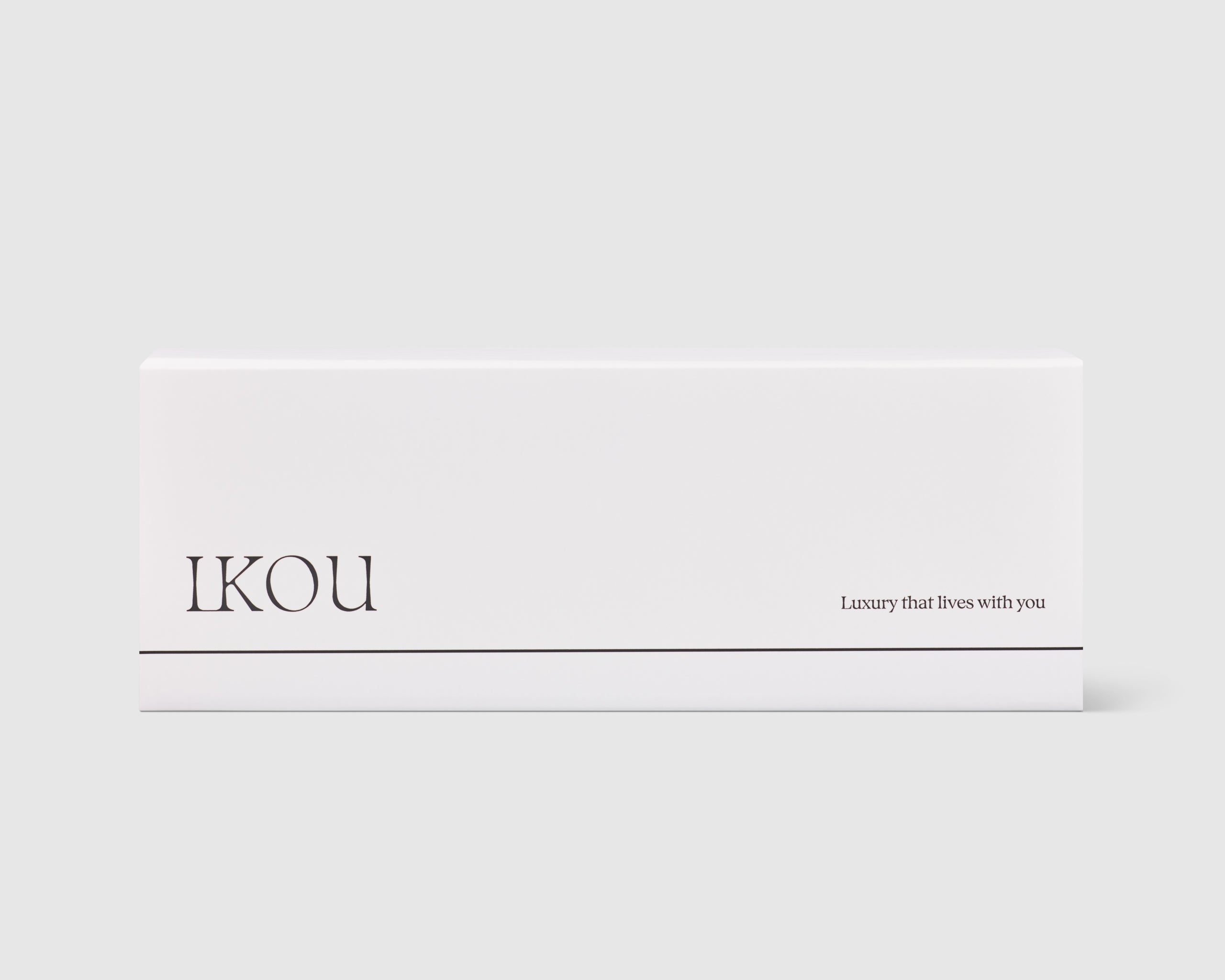 iKOU Sanctuary Candle Trio gift pack with three elegant candles in decorative containers, perfect for gifting or home decor.
