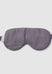 Gray sleep mask on a light gray background